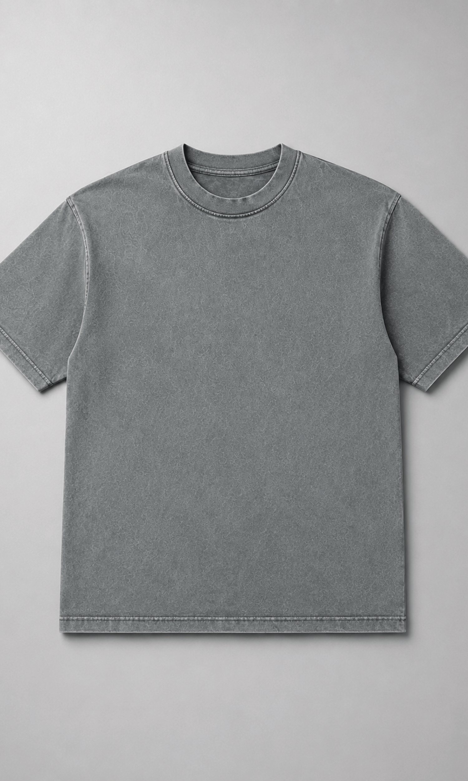 Male model wearing acid wash grey oversized t-shirt full body back