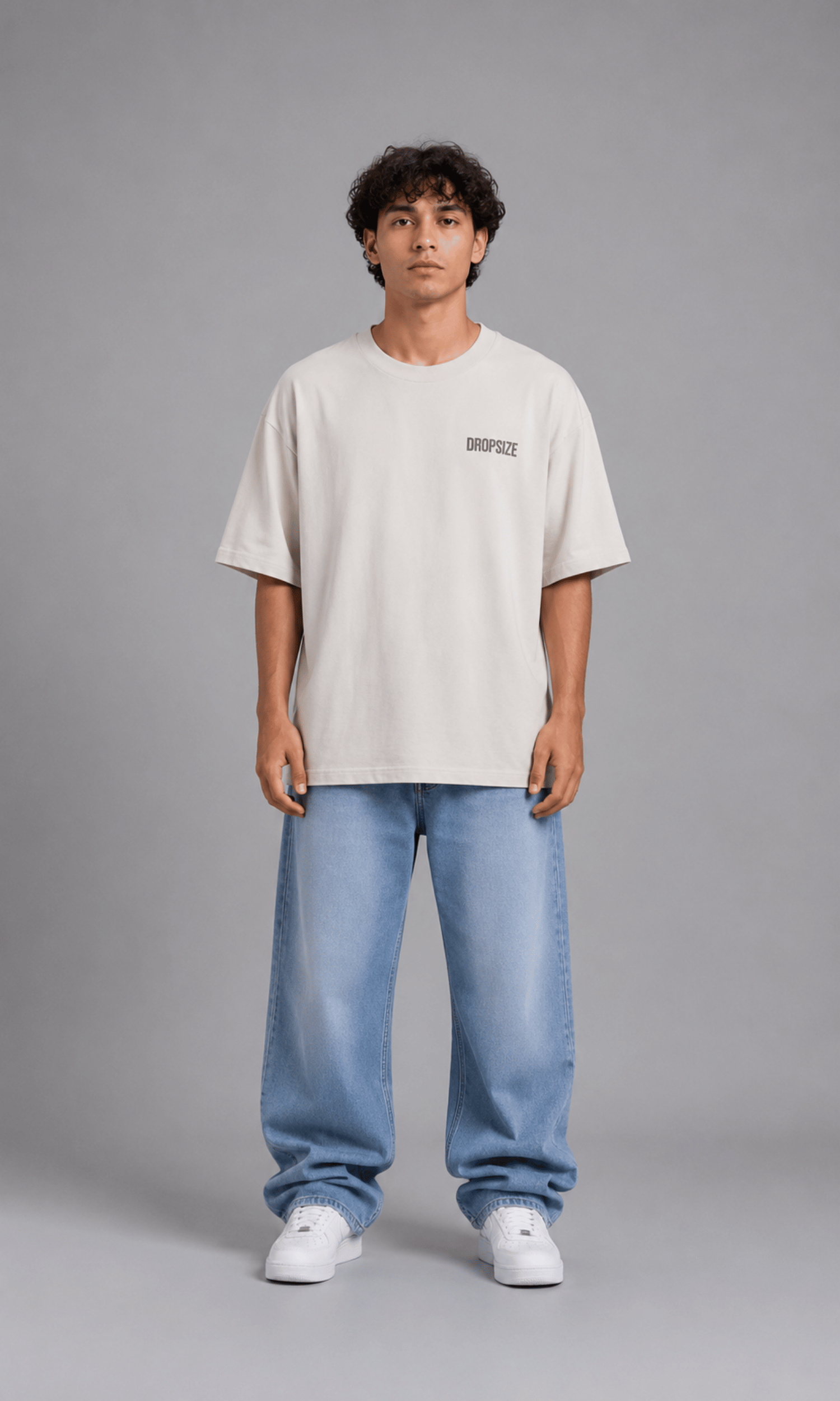 Dropsize Hustle Club Tee - Front view on model with jeans