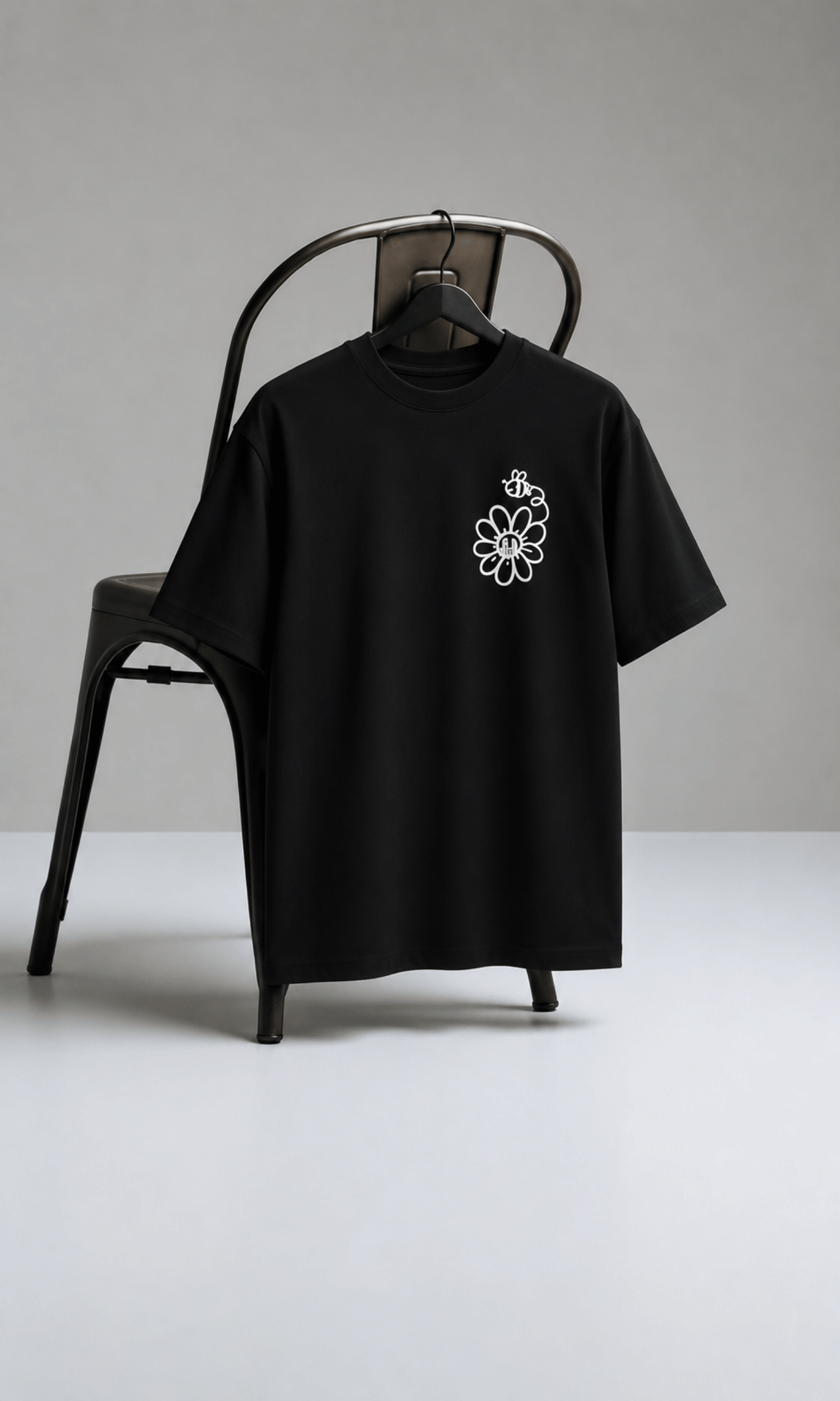 Bee & Daisy Oversized Tee - back on chair