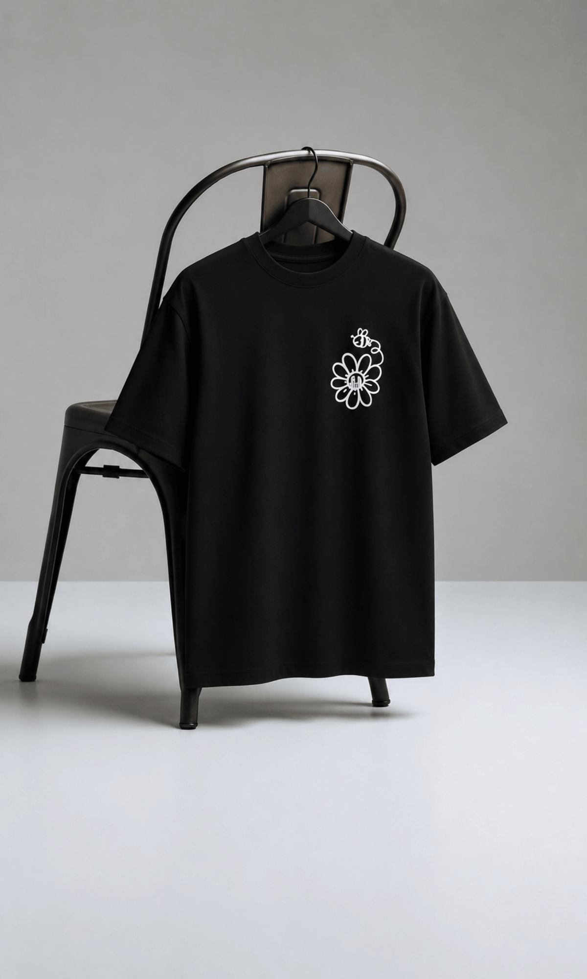 Bee & Daisy Oversized Tee - back on chair