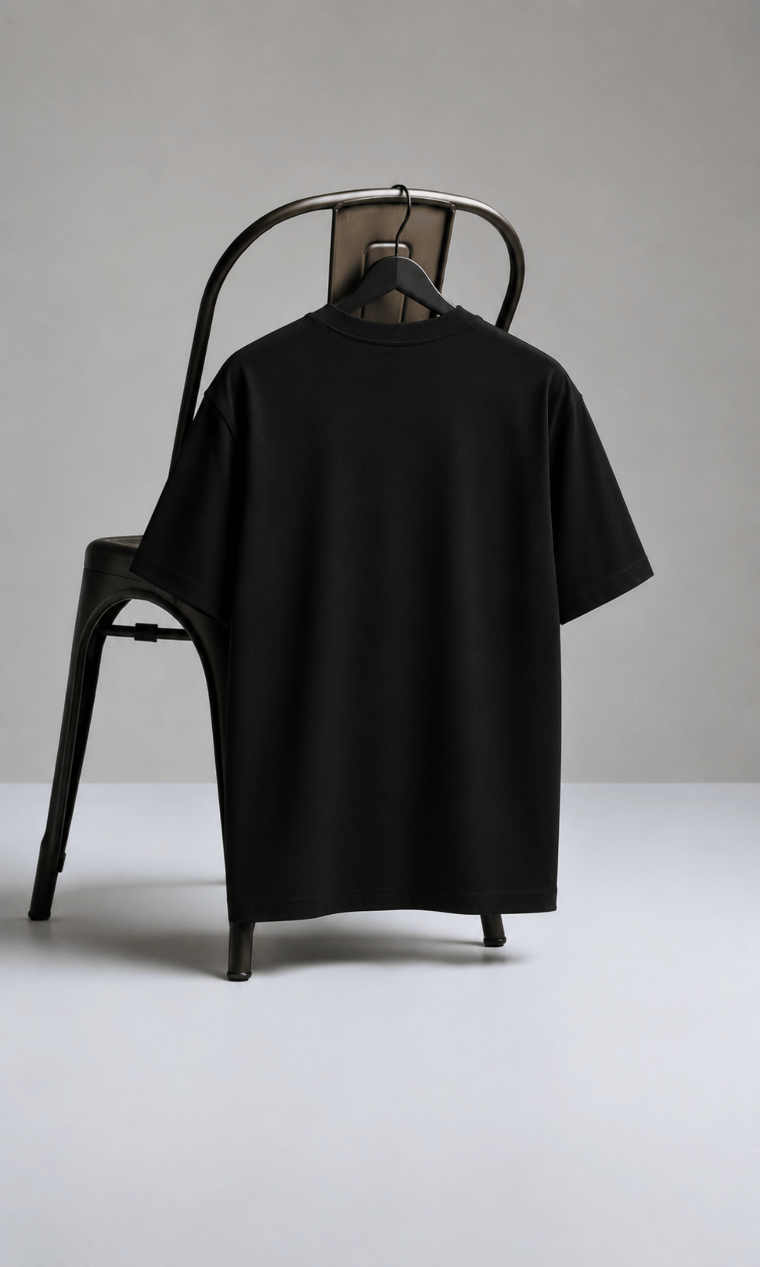 Bee & Daisy Oversized Tee - front on chair