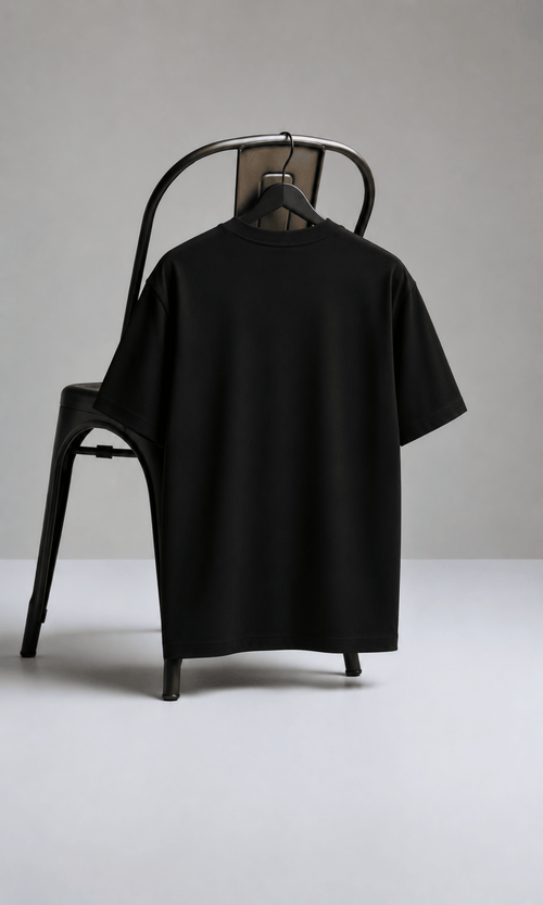 Bee & Daisy Oversized Tee - front on chair