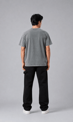 Male model wearing acid wash grey oversized t-shirt full body front